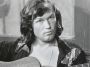 Kris Kristofferson playing guitar