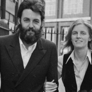 Paul and Linda McCartney walking in the city