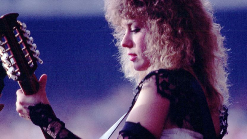 Nancy Wilson playing guitar