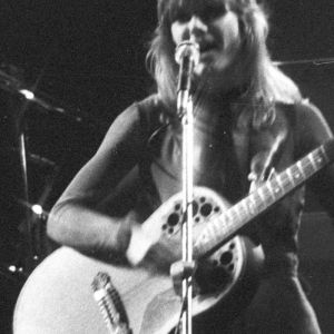 Nancy Wilson of Heart playing guitar