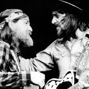 Willie Nelson and Waylon Jennings performing