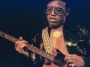 Bobby Womack performs on stage in 1976 in Amsterdam, Netherlands. He plays a left-handed Gibson Les Paul Junior guitar. (Photo by Gijsbert Hanekroot/Redferns)