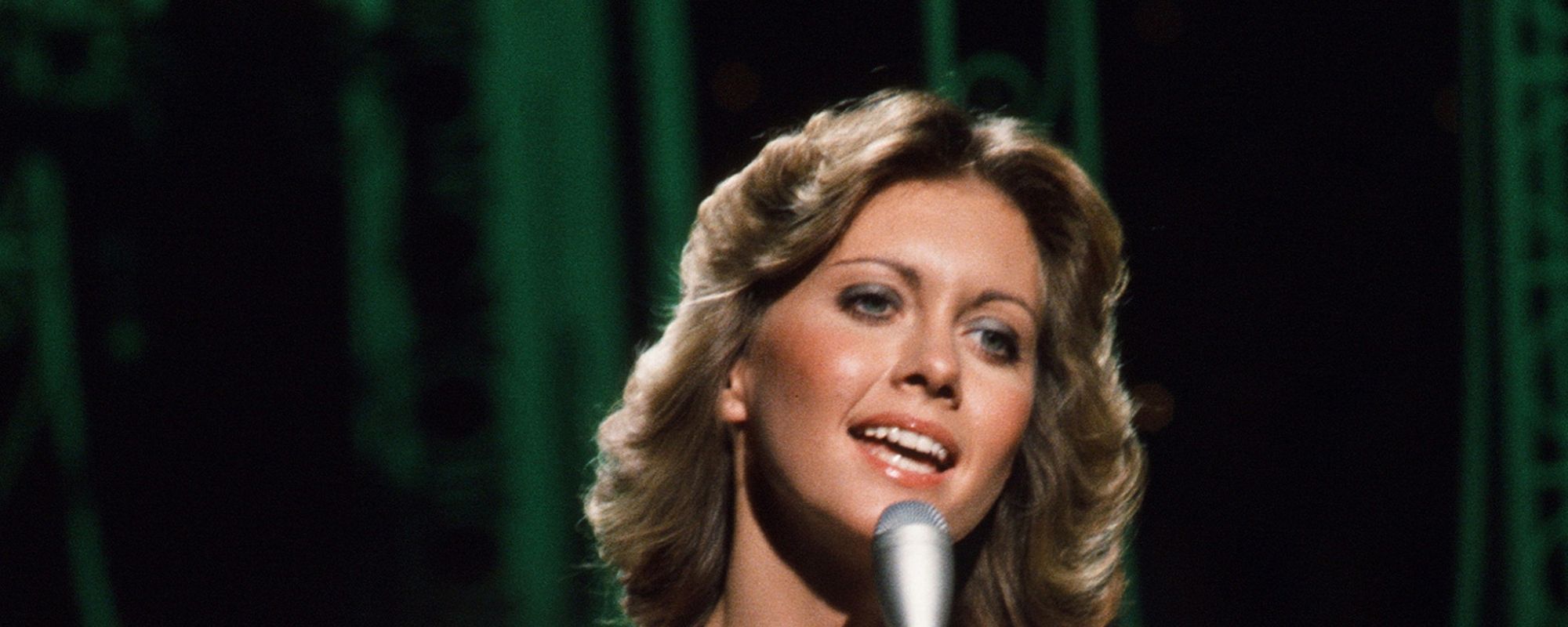 On This Day in 1975, This ‘Grease’ Movie Star Ruled the Charts With Thir Second Straight No. 1 Hit—an Ode To Slowing Down