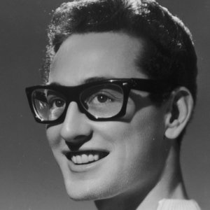 Buddy Holly, who was at the very least inspired by artists who were inspired by Johnny Barfield