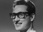 Buddy Holly, who was at the very least inspired by artists who were inspired by Johnny Barfield