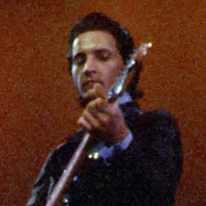 Bob Wootton on stage with Johnny Cash