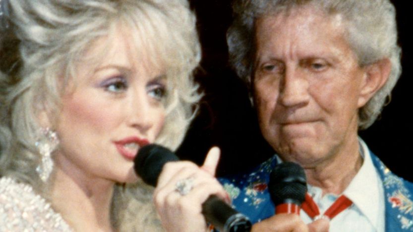 Dolly Parton and Porter Wagoner on stage together