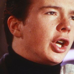 Rick Astley performing in the 80s