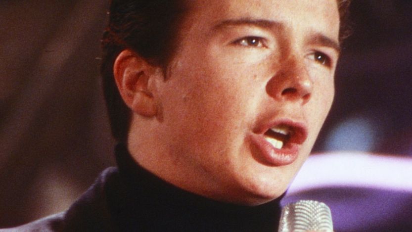 Rick Astley performing in the 80s