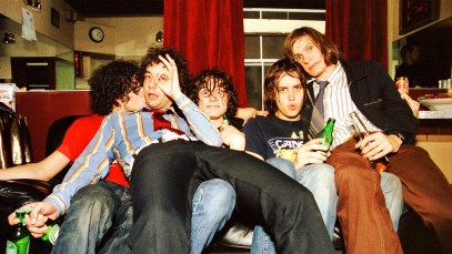 Portrait of The Strokes backstage at The Fillmore, San Francisco, California, USA on 16th October 2001, L-R Fabrizio Moretti, Albert Hammond Jr, Nick Valensi, Julian Casablancas and Nikolai Fraiture. (Photo by Anthony PIdgeon/Redferns)