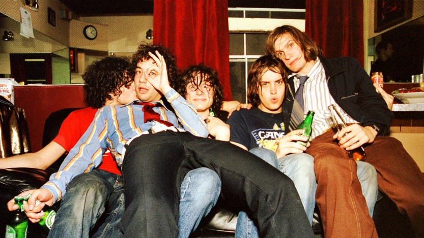 Portrait of The Strokes backstage at The Fillmore, San Francisco, California, USA on 16th October 2001, L-R Fabrizio Moretti, Albert Hammond Jr, Nick Valensi, Julian Casablancas and Nikolai Fraiture. (Photo by Anthony PIdgeon/Redferns)