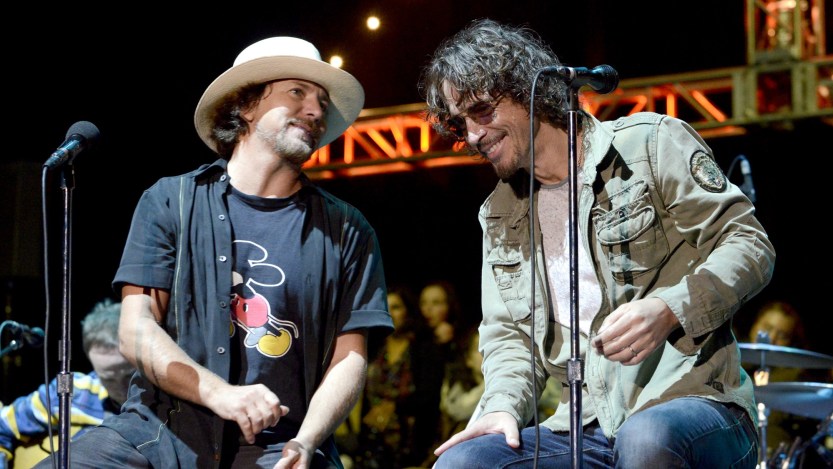 MOUNTAIN VIEW, CA - OCTOBER 26: Eddie Vedder (L) of Pearl Jam and Chris Cornell perform during the 28th annual Bridge School Benefit at Shoreline Amphitheatre on October 26, 2014 in Mountain View, California. (Photo by Tim Mosenfelder/Getty Images)