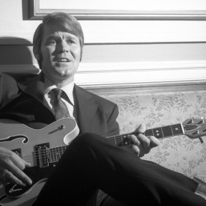 NEW YORK - JANUARY 7: Glen Campbell relaxes in The Plaza Hotel, New York, NY. Image dated January 7, 1969. (Photo by CBS via Getty Images)