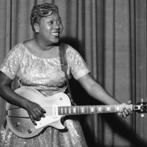American gospel singer and guitarist Sister Rosetta Tharpe (1915 - 1973) playing a Gibson Les Paul electric guitar on stage with Chris Barber's Jazz Band, Cardiff, Wales, November 1957. (Photo by Chris Ware/Keystone Features/Hulton Archive/Getty Images)