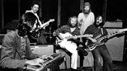 CIRCA 1965: Pedal steel guitarist Ricky Fataar and fellow South African guitarist Terence William 'Blondie' Chaplin join Al Jardine, Mike Love and Carl Wilson of the rock and roll band "The Beach Boys" onstage in circa 1972. (Photo by Michael Ochs Archives/Getty Images)