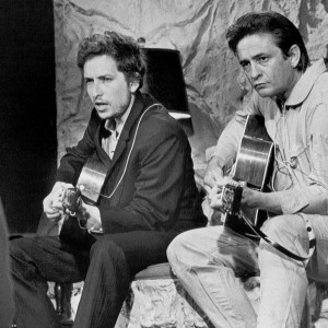 NASHVILLE, TN - JUNE 7: Bob Dylan and Johnny Cash perform together with acoustic guitars on 'The Johnny Cash Show' on June 7, 1969 in Nashville, Tennessee. (Photo by Michael Ochs Archives/Getty Images)