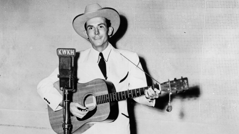 SHREVEPORT, LA - CIRCA 1947: Hank Williams performs on KWKH Radio circa 1947 in Shreveport, Louisiana. Photo by Michael Ochs Archives/Getty Images