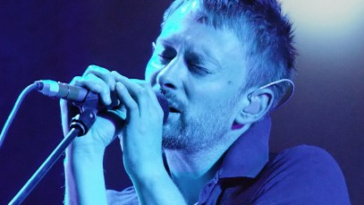 Thom Yorke of British rock group Radiohead performs on the main stage at the V Festival near Chelmsford in Essex, 19 August 2006. Radiohead announced Monday 01 October 2007 that they will be selling their latest album at a bargain price: whatever the customer wants to pay for the download. "It's up to you" says a website message instead of a price for the record, "In Rainbows," to be released on 10 October 2007, although a hard copy packaged version will also be available for 40 pounds. AFP PHOTO/LEON NEAL (Photo credit should read Leon Neal/AFP via Getty Images)