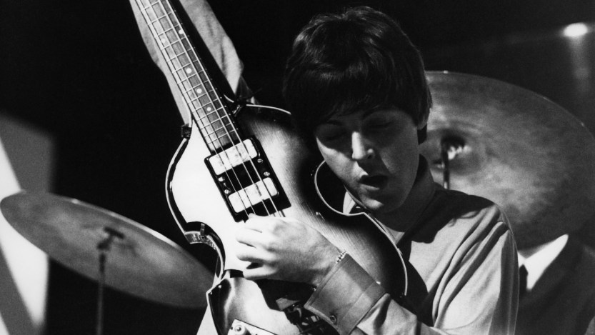 Paul McCartney of English rock and pop group The Beatles tunes up his Hofner 500/1 violin bass guitar on stage during rehearsals for the ABC Television music television show 'Thank Your Lucky Stars' Summer Spin at Teddington Studios in London on 11th July 1964. The band would go on to play four songs on the show, A Hard Day's Night, Long Tall Sally, Things We Said Today and You Can't Do That. (Photo by David Redfern/Redferns)