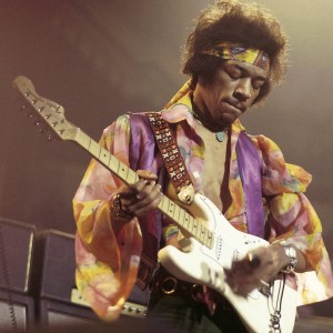 American rock guitarist and singer Jimi Hendrix (1942-1970) performs live on stage playing a white Fender Stratocaster guitar with The Jimi Hendrix Experience at the Royal Albert Hall in London on 24th February 1969. (Photo by David Redfern/Redferns)
