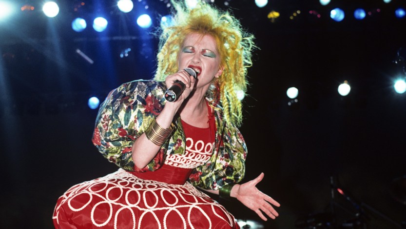 (MANDATORY CREDIT Ebet Roberts/Getty Images) Cyndi Lauper performing at a WNEW Christmas Concert at Madison Square Garden in New York City on December 19, 1986. (Photo by Ebet Roberts/Redferns)