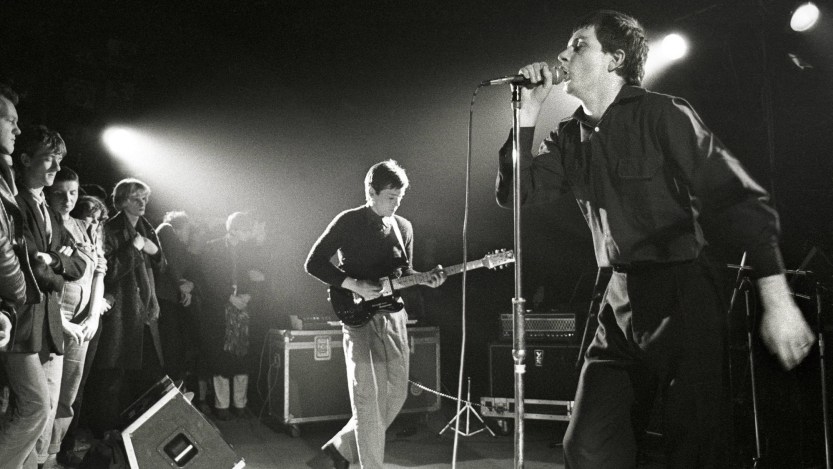 NETHERLANDS - JANUARY 16: ROTTERDAM Photo of Joy Division performing live in Rotterdam, Bernard Sumner (left) & Ian Curtis (Photo by Rob Verhorst/Redferns)