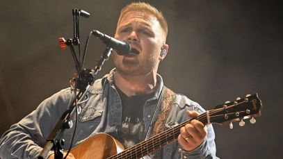 Zach Bryan Brings Out Comedian for Warren Zevon Cover in Charlotte: “It Was, Uh, Really Something”