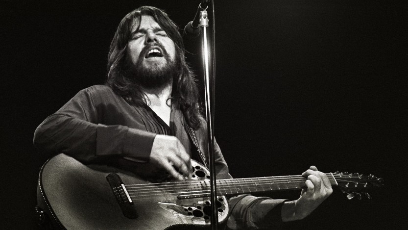 ROTTERDAM, NETHERLANDS - DECEMBER 3: Bob Seger performs on stage at Ahoy on 3rd December 1980 in Rotterdam, Netherlands. He plays an Ovation acoustic guitar. (Photo by Rob Verhorst/Redferns)