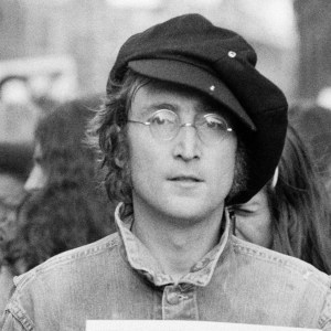Portrait of British musician John Lennon (1940 - 1980) (center) and his wife, artist and musician Yoko Ono (extreme left) as they attend an unspecified rally in Hyde Park, London, England, 1975. (Photo by Rowland Scherman/Getty Images)