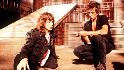 Singer Mick Jagger and guitarist Keith Richards of the Rolling Stones on the set of the music video for 'One Hit (To the Body)' in England in May 1986. (Photo by Michael Putland/Getty Images)