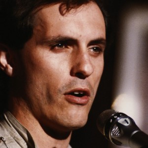 Peter Schilling, German synthpop musician, singing into a microphone during a live concert performance at the Montreux Rock Festival, in Montreux, Switzerland, May 1984. (Photo by David Redfern/Redferns/Getty Images)