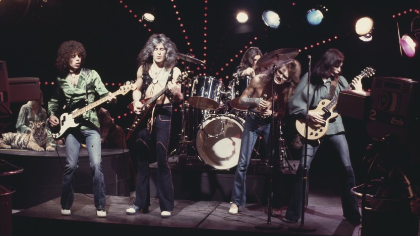 British band Silverhead in concert, circa 1975. From left to right, bassist Nigel Harrison, guitarist Robbie Blunt, singer Michael Des Barres, and guitarist Rod Rook Davies, with drummer Pete Thompson at the back. (Photo by Richard Creamer/Michael Ochs Archives/Getty Images)