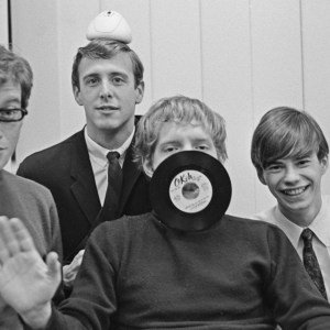 American rock group The Cyrkle (American drummer Marty Fried, American singer and guitarist Don Dannemann, American singer and guitarist Tom Dawes (1944-2007), and American keyboard player Michael Losekamp), pose with Dawes having an unspecified Okeh Records seven-inch record over his mouth, location unspecified, circa 1965. (Photo by Don Paulsen/Michael Ochs Archives/Getty Images)