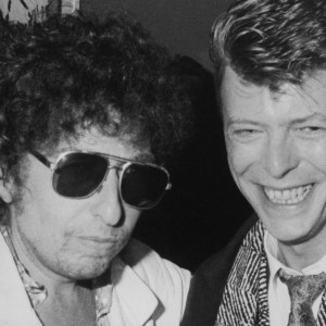 American singer-songwriter Bob Dylan and British singer-songwriter David Bowie (1947-2016) attend a party to celebrate the release of 'Biograph,' Dylan's career retrospective box set, held at the Whitney Museum of American Art, in New York City, New York, 13th November 1985. (Photo by Vinnie Zuffante/Getty Images)