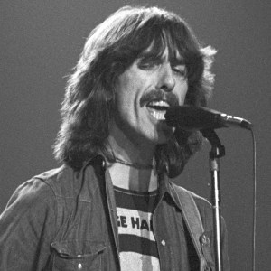 English Pop and Rock musician George Harrison (1943 - 2001) plays guitar as he performs onstage at Olympia Stadium, Detroit, Michigan, December 4, 1974. (Photo by Steve Kagan/Getty Images)