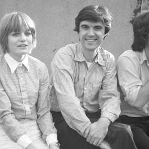 The three founding members of Talking Heads on a Manhattan rooftop, US, 1976. (Jerry Harrison would join the group at the beginning of 1977.) (L-R) Bassist Tina Weymouth, singer-guitarist David Byrne and drummer Chris Frantz. (Photo by Linda D. Robbins/Getty Images)
