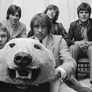Pop group the Bee Gees posed with a stuffed polar bear in an office in London circa April 1968. Members of the band are, from left, Colin Petersen, Barry Gibb, Maurice Gibb (1949-2003), Robin Gibb (1949-2012) and Vince Melouney. (Photo by Ivan Keeman/Redferns)