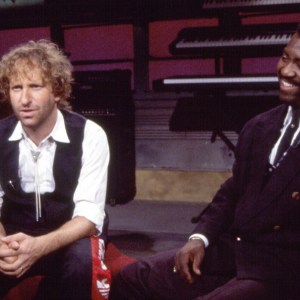 View of American Rock, Pop, and Dance musicians David Was (born David Weiss) (left) and Harry Bowens, both of the group Was (Not Was), during an interview on MTV, New York, New York, June 21, 1989. (Photo by Gary Gershoff/Getty Images)