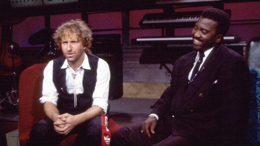View of American Rock, Pop, and Dance musicians David Was (born David Weiss) (left) and Harry Bowens, both of the group Was (Not Was), during an interview on MTV, New York, New York, June 21, 1989. (Photo by Gary Gershoff/Getty Images)