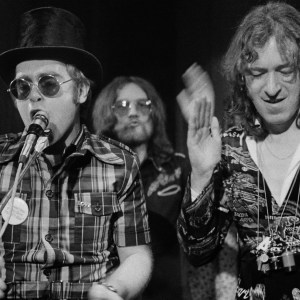 English singer-songwriter and pianist Elton John (left) performing at the Rocket Records launch party, Moreton-on-the Marsh, Gloucestershire, 26th April 1973. (Photo by Michael Putland/Getty Images)
