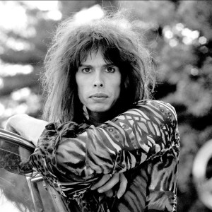 Steven Tyler of rock group Aerosmith in his 1956 Mercedes Benz 220S at Jamaica Pond, Boston MA October 9, 1975