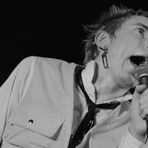 Johnny Rotten (John Lydon) singing with British punk band The Sex Pistols at the Electric Circus, Manchester, 9th December 1976. (Photo by Evening Standard/Hulton Archive/Getty Images)
