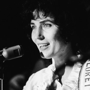 American country music singer and guitarist Loretta Lynn performs on stage at the Grand Ole Opry, circa 1965. (Photo by Hulton Archive/Getty Images)