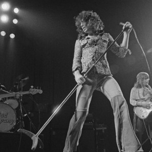 English rock group Bad Company peforming on stage, 8th April 1974. Left to right: Boz Burrell (1946 - 2006), Paul Rodgers and Mick Ralphs. (Photo by Michael Putland/Getty Images)