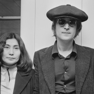 Singer and songwriter John Lennon (1940 - 1980) and his wife Yoko Ono arrive at London Airport from New York, 14th July 1971. (Photo by R. Brigden/Daily Express/Getty Images)