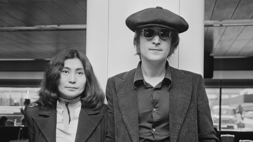 Singer and songwriter John Lennon (1940 - 1980) and his wife Yoko Ono arrive at London Airport from New York, 14th July 1971. (Photo by R. Brigden/Daily Express/Getty Images)