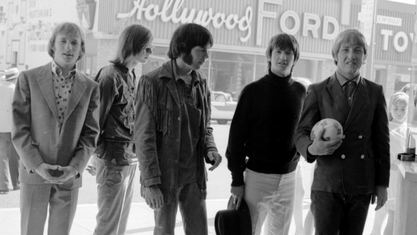 HOLLYWOOD - 1966: Supergroup "Buffalo Springfield" perform pose for a portrait outside a movie theatre in 1966 in Hollywood, California. (L-R) Stephen Stills, Bruce Palmer, Neil Young, Richie Furay, Dewey Martin. (Photo by Michael Ochs Archives/Getty Images)
