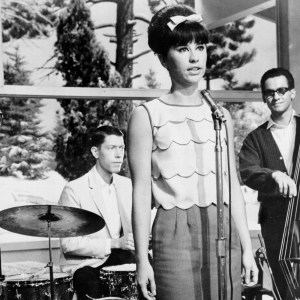 Stan Getz (left) and Astrud Gilberto are the Go Go set in a scene from the film 'Get Yourself A College Girl', 1964. Photo by Michael Ochs Archives/Getty Images