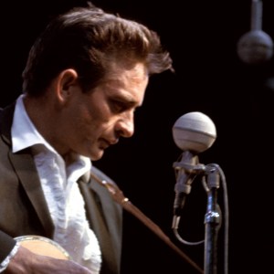 UNITED STATES - JULY 24: NEWPORT FOLK FESTIVAL Photo of Johnny CASH, Johnny Cash performing on stage (Photo by Gai Terrell/Redferns)