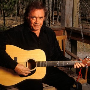 UNITED STATES - JANUARY 01: NASHVILLE Photo of Johnny CASH, Posed portrait of Johnny Cash with Takamine acoustic guitar (Photo by Beth Gwinn/Redferns)